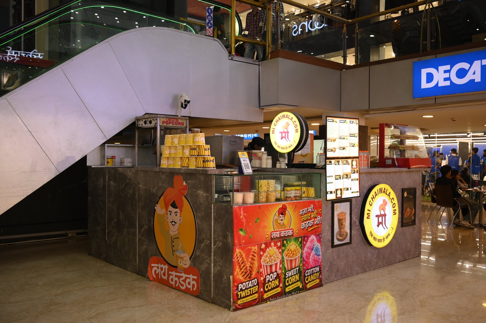 Kids enjoying free candy and popcorn at SGS Mall